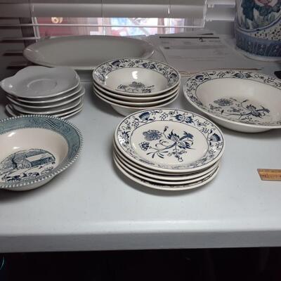 Lot of 18 assorted bowls and plates