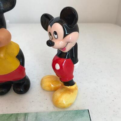 Two Mickey Mouse toy figures