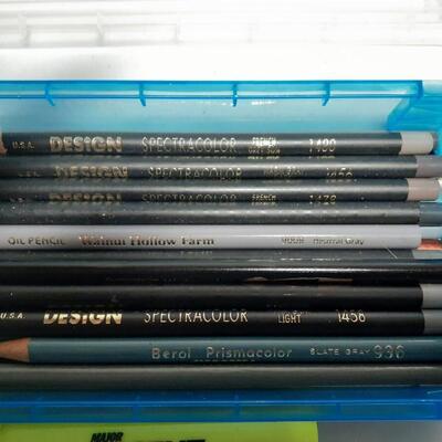 Assorted artist pencils and hi lighters