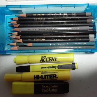 Assorted artist pencils and hi lighters