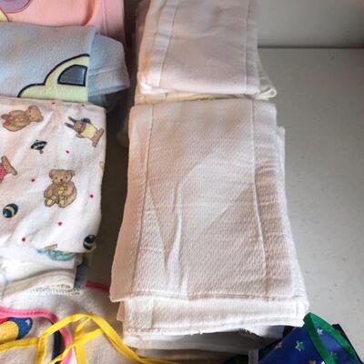 Baby diapers, bibs, and towels