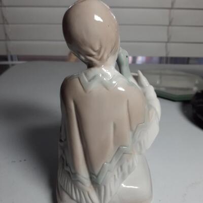 6in tall porcelan Boy with Goose