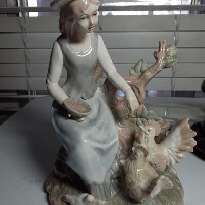 Vintage porcelan 9in tall Lady feeding chickens