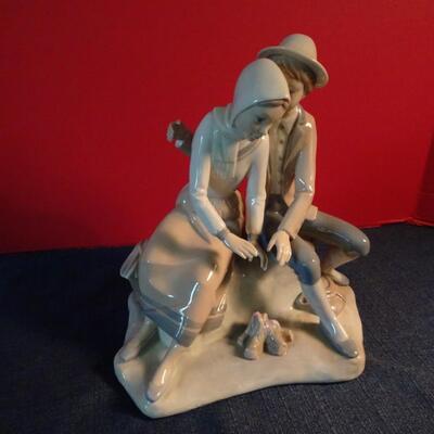 LOT 19. FIGURINE BY LAPHIN