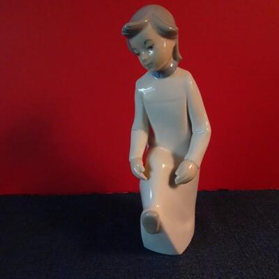 LOT 26.  REX FIGURINE