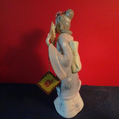 LOT 30. NADAL FIGURINE  12"