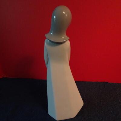 LOT 31. REX FIGURINE  9"