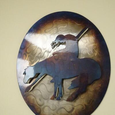 LOT 48. NATIVE AMERICAN INSPIRED METAL WALL DECOR