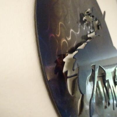 LOT 48. NATIVE AMERICAN INSPIRED METAL WALL DECOR