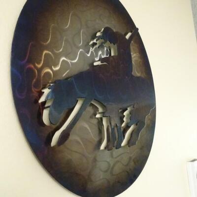 LOT 48. NATIVE AMERICAN INSPIRED METAL WALL DECOR