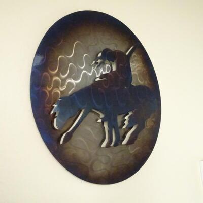 LOT 48. NATIVE AMERICAN INSPIRED METAL WALL DECOR