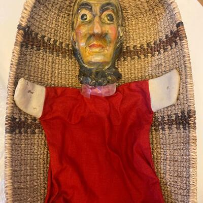 Eleven antique clay head puppets