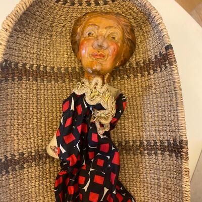 Eleven antique clay head puppets