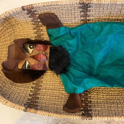 Eleven antique clay head puppets
