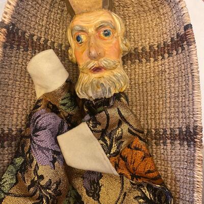 Eleven antique clay head puppets