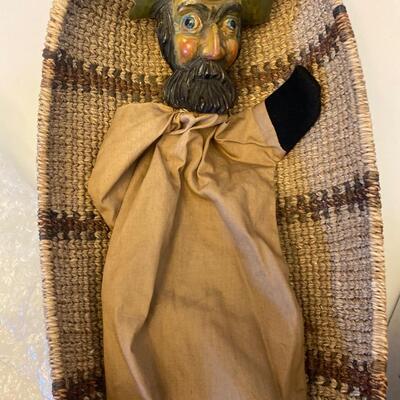 Eleven antique clay head puppets