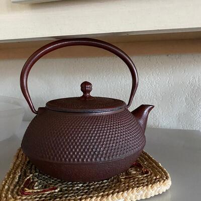 Heavy iron teapot