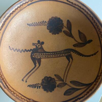 Decorated figural clay platter