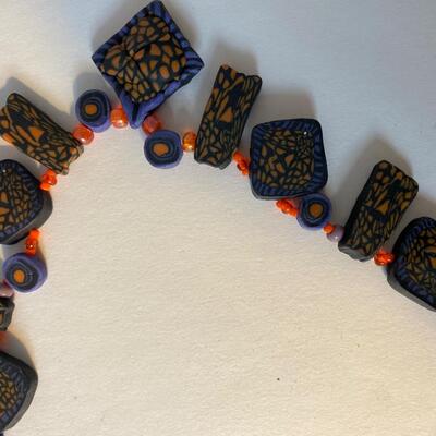 Pair of modern art style polymer or clay necklaces