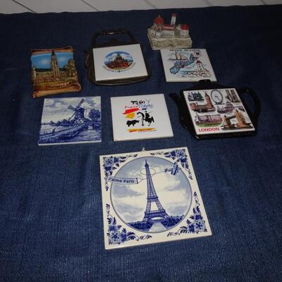 LOT 98. TILES AND TRIVETS