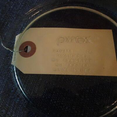 LOT 104. THREE GLASS PYREX BOWLS