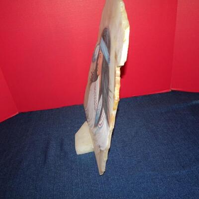 LOT 129. ART ON STONE
