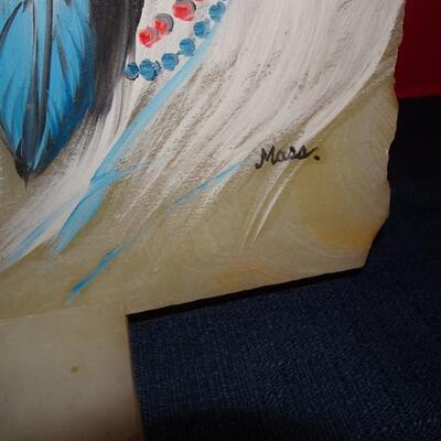 LOT 129. ART ON STONE