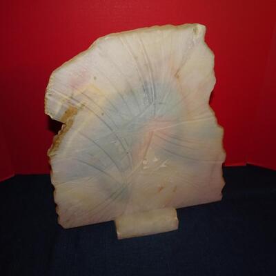 LOT 129. ART ON STONE
