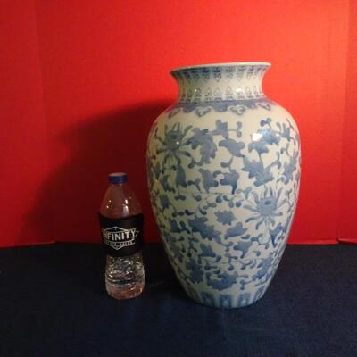 LOT 157. BLUE AND WHITE  VASE