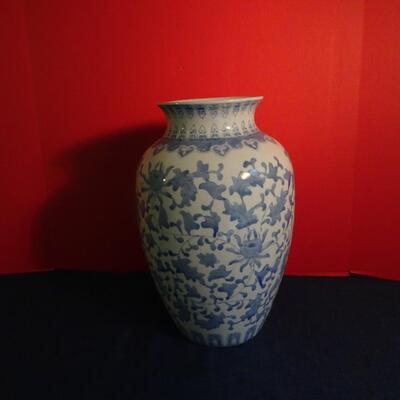 LOT 157. BLUE AND WHITE  VASE