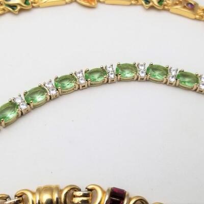Lot #69  Lot of 4 Fashion Bracelets - one Joan Rivers