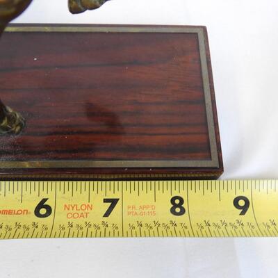 Brass Carousel Horse on a Laminate Wood Stand.  Weighted Base