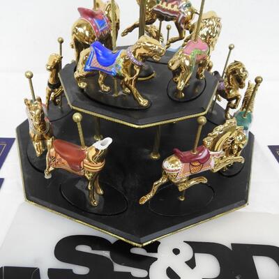 11 Pc Faberge Golden Carousel Includes 2 Tier Base. Some items are broken.