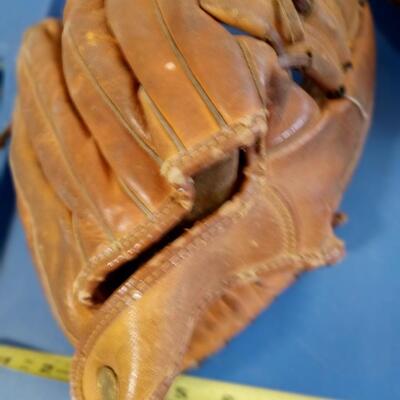 LOT 123  TWO OLD BASEBALL MITTS