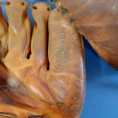 LOT 123  TWO OLD BASEBALL MITTS