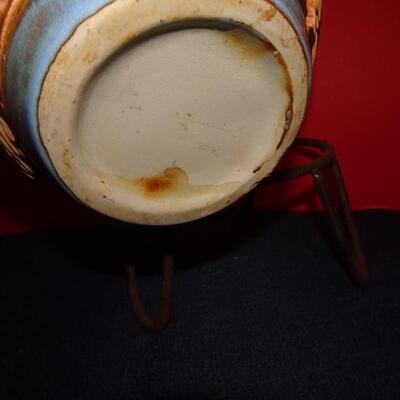 LOT 210. NATIVE AMERICAN INSPIRED DECOR  VASE ON METAL STAND
