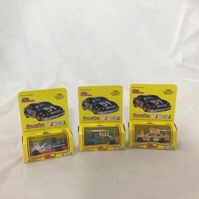 143) NASCAR | Richard Petty and Mixed Group of Racing Champion Figures