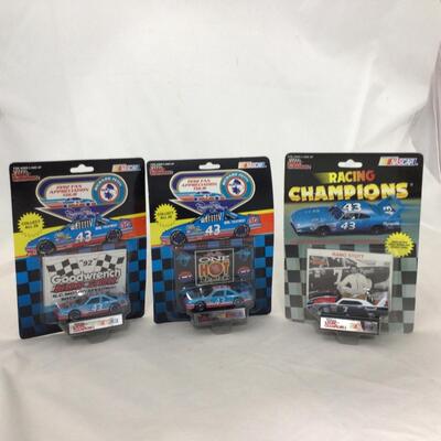 143) NASCAR | Richard Petty and Mixed Group of Racing Champion Figures