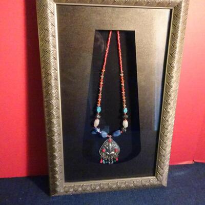 LOT 218. NATIVE AMERICAN INSPIRED WALL DECOR