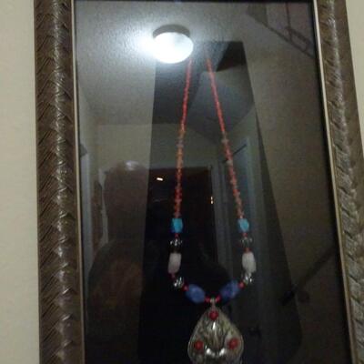LOT 218. NATIVE AMERICAN INSPIRED WALL DECOR