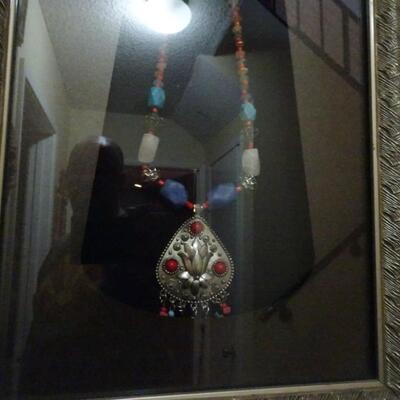 LOT 218. NATIVE AMERICAN INSPIRED WALL DECOR