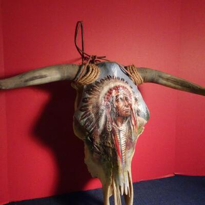 LOT 220. NATIVE AMERICAN INSPIRED HAND PAINTED SKULL