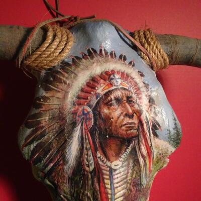 LOT 220. NATIVE AMERICAN INSPIRED HAND PAINTED SKULL