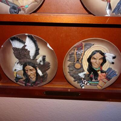 LOT 223.  NATIVE AMERICAN INSPIRED PLATES ON WALL RACK