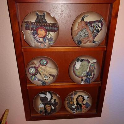 LOT 223.  NATIVE AMERICAN INSPIRED PLATES ON WALL RACK