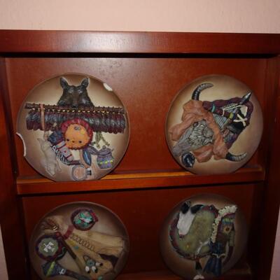 LOT 223.  NATIVE AMERICAN INSPIRED PLATES ON WALL RACK