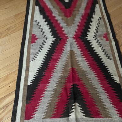 Southwest rug showing damage 4x8â€™