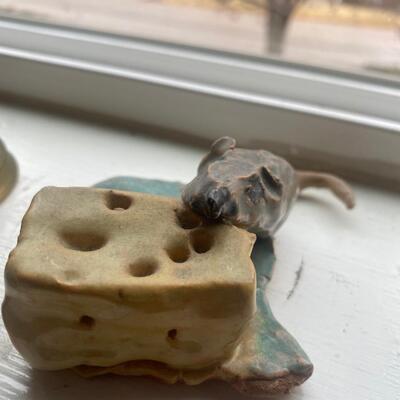 Clay mouse and cheese figure