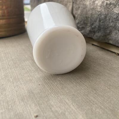 Vintage milk glass bottle with pink lid