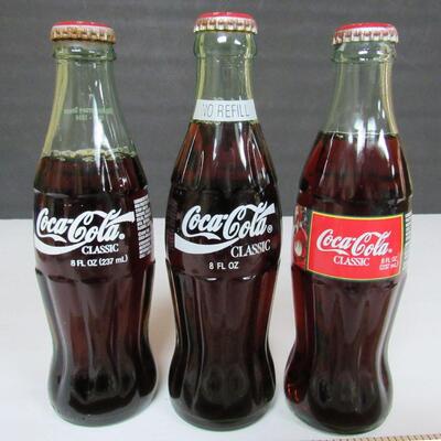 Vintage Full Coca Cola Bottles: Santa With Dog 1995, Brewers 25th 1994, Happy Holidays Santa 1993